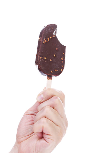 istock Hand holding chocolate ice cream. 535937375