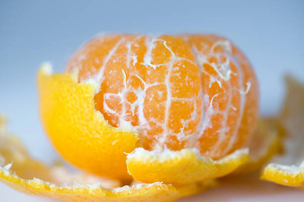istock Peeled tangerine or mandarin fruit macro 535938775