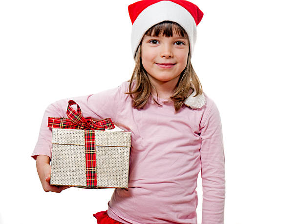 istock Child with Santa Claus hat holding gift 535939101