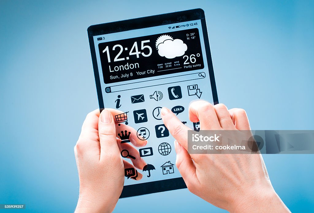 Tablet with transparent screen in human hands. Tablet with a transparent display in human hands. Concept actual future innovative ideas and best technologies humanity. 2015 Stock Photo