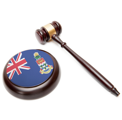 Judge gavel and soundboard with national flag on it - Cayman Islands