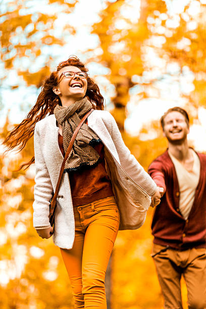 istock Playful ginger couple in autumn. 535941483