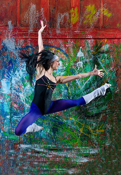 istock girl jump of art graffiti 535943373