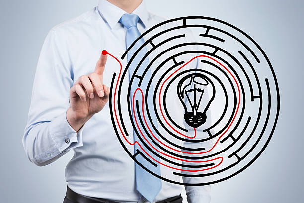 istock man drawing out of labyrinth 535943539