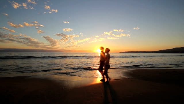 couple on a sunset beach
