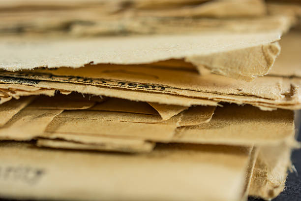 Stack of very old Yellowed Newspapers