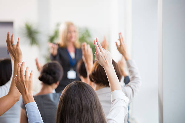 istock Group of women voting during seminar 535967097