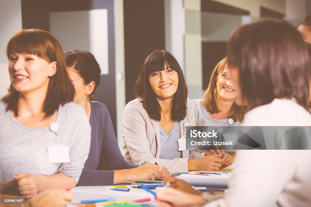 Group of women during seminar Group of women attending a training, working together and discussing. 2015 Stock Photo