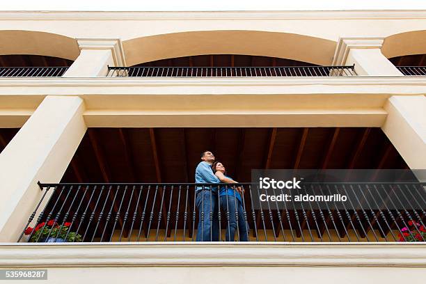 Happy Mature Couple At Balcony Stock Photo - Download Image Now - 40-44 Years, 45-49 Years, Adult