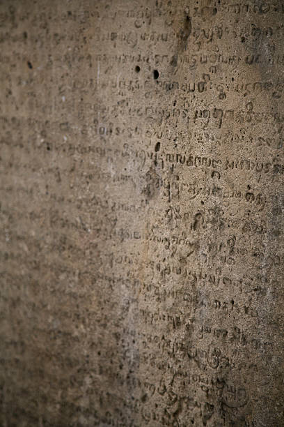 istock Text Engraved Writing Hinduism Letter Temple Asia Indonesia Architecture Calligraphy 535968349