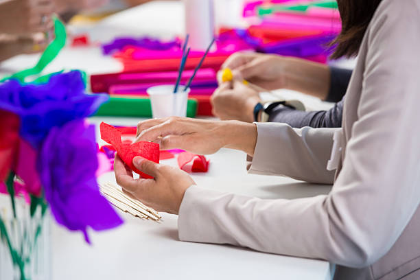 istock Women making paper flowers 535968455