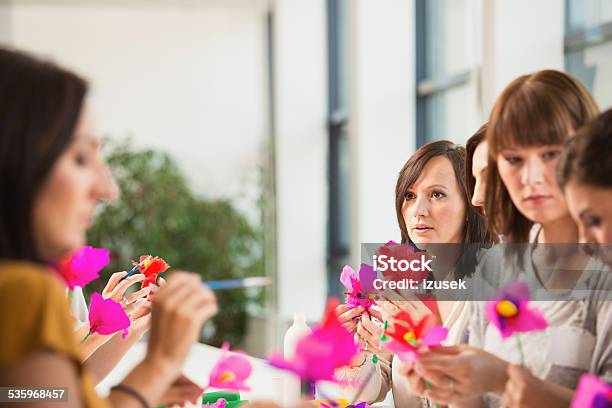 Group Of Women Making Paper Flowers Stock Photo - Download Image Now - Blotter, 2015, Adult