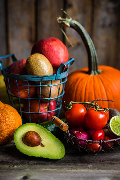 istock Fruits and vegetables on wooden background 535971683