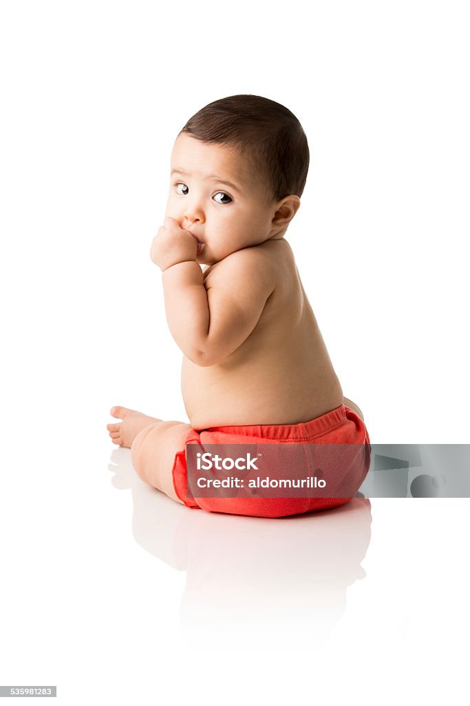 Cute baby girl sucking her thumb Portrait of a cute baby girl sucking her thumb isolated over white background Baby - Human Age Stock Photo