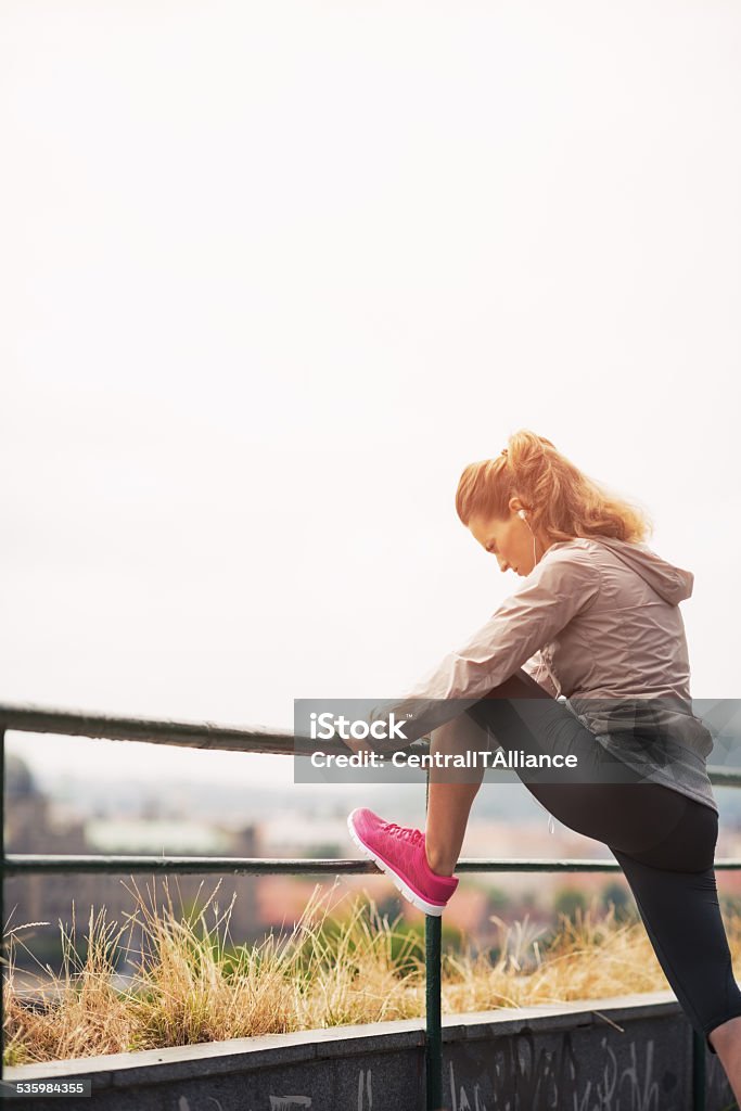 fitness young woman stretching outdoors Fitness young woman stretching outdoors Active Lifestyle Stock Photo