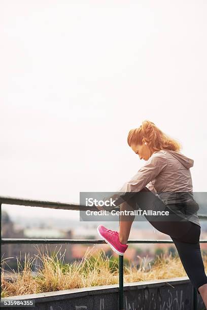 Fitness Young Woman Stretching Outdoors Stock Photo - Download Image Now - Active Lifestyle, Adult, Copy Space