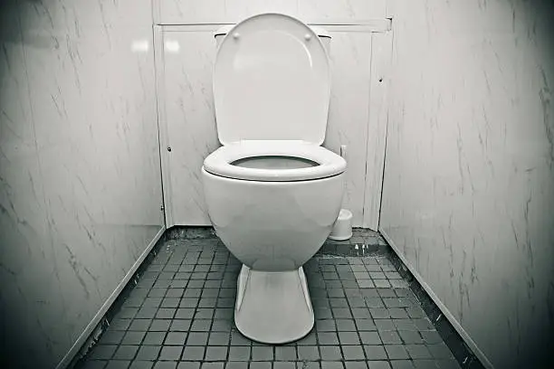 Photo of Toilet in the bathroom of economy class