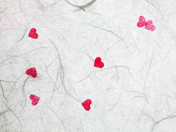 istock White mulberry paper with red hearts 535987221