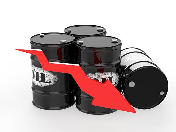 istock Oil Barrels with Red Arrow down 535987621