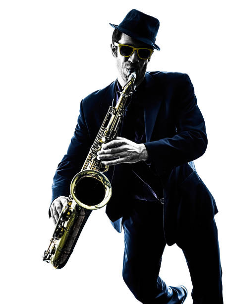 istock man saxophonist playing saxophone player  silhouette 535988361