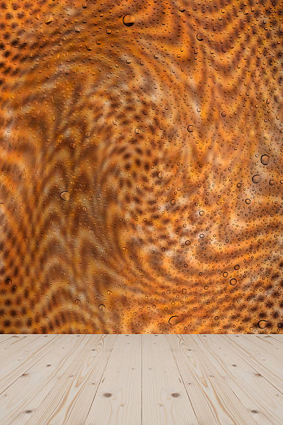 istock pine wood and drop water on glass background 535990643