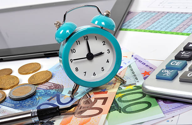 istock clock and euro money 536010265