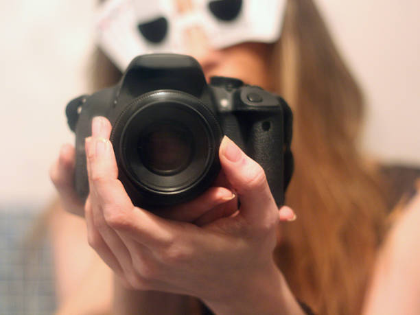 Woman in sunglasses Taking a photo