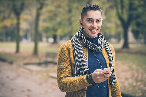 istock young handsome caucasian man in autumn park 536011409