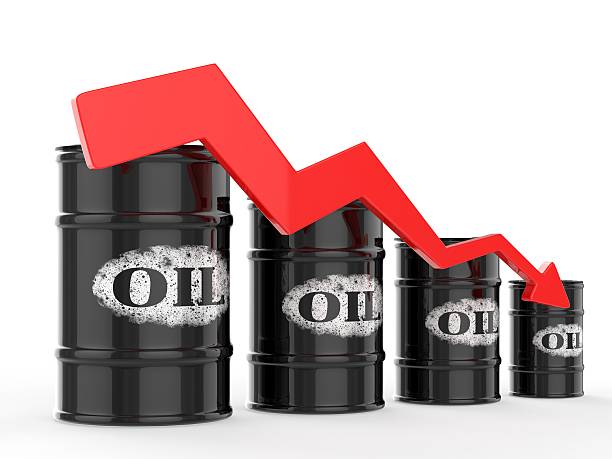 istock Oil Barrels with Red Arrow down 536012331