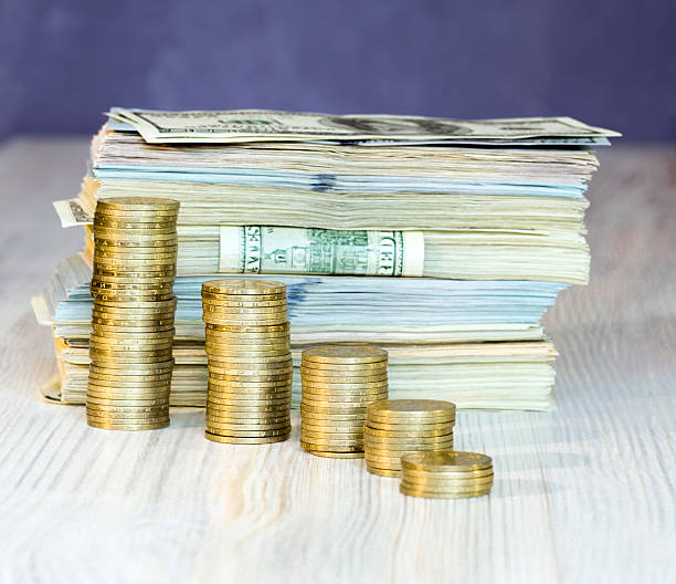 istock Columns build off coins large large stack of paper currency 536012925