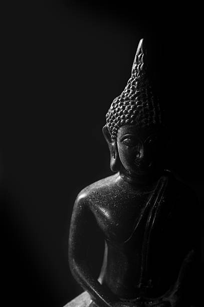 istock Low key light of Buddha statue. 536014095