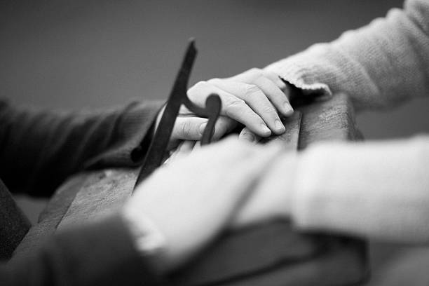 istock Couple holding hands over a sundial - Stock Image 536014507