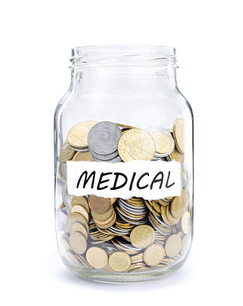 Jar with coins on Medical Jar with coins on Medical, money isolated on white. australian 5 cents stock pictures, royalty-free photos & images