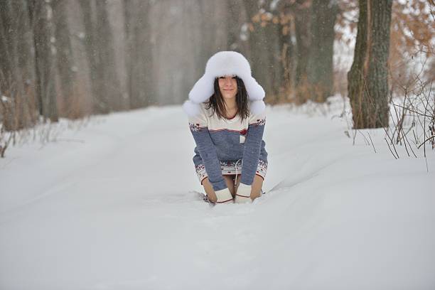 istock Winter portrait playful woman in forest 536015965