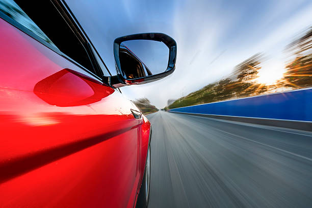 istock car on the road with motion blur background. 536016563