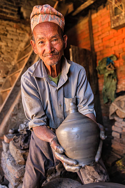 istock Nepalese potter working in Bhaktapur 536025649