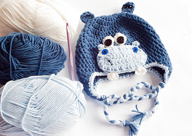 istock Yarn and hippo baby hat 536027235