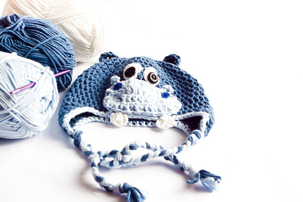 istock Yarn and hippo baby hat 536027287