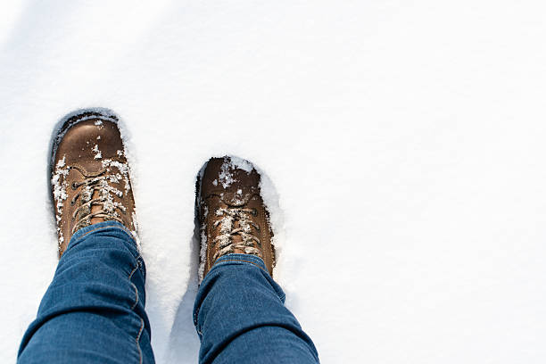 istock Hiking boots in the snow 536028145