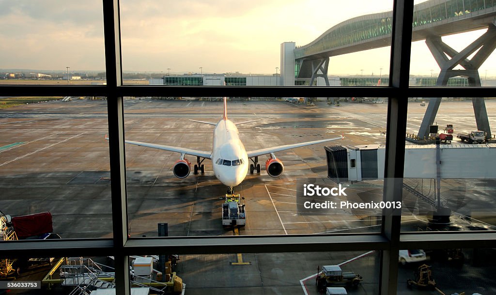 Passenger Airline Being Refuelled Passenger plane being refuelled in a UK airport. Airport Stock Photo