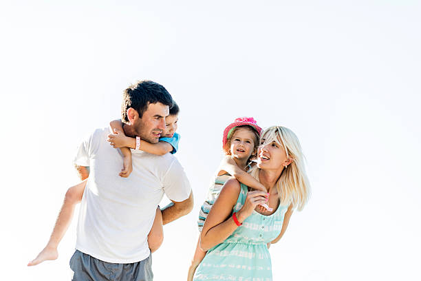istock Family piggybacking against the sky. 536034043