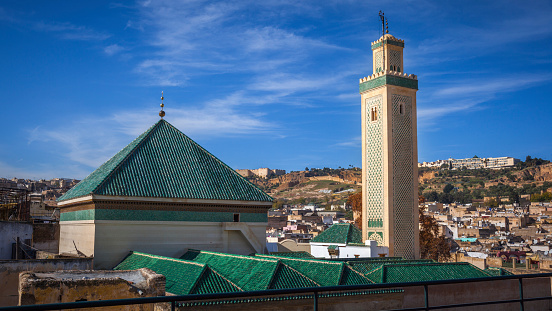 The minaret and roof of the Kairaouine Mosque in Fez, Morocco