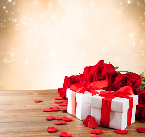 istock Gifts with roses on wooden table 536036357
