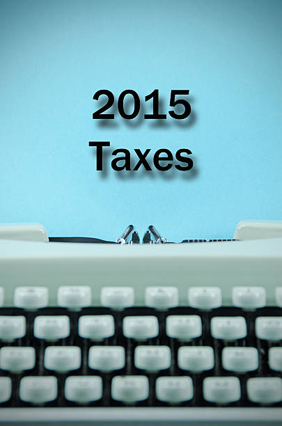 istock Taxes 2015 on a retro typewriter 536050465
