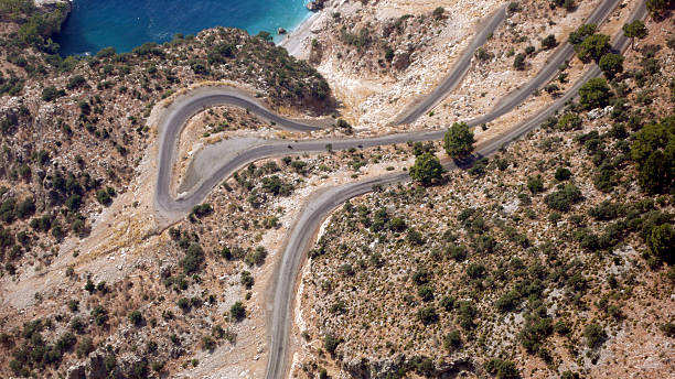 istock aerial curvy clean asphalt road 536051767
