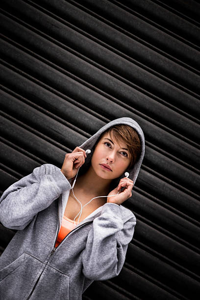 istock Runner Putting Earphones In Ears Before Run 536051879