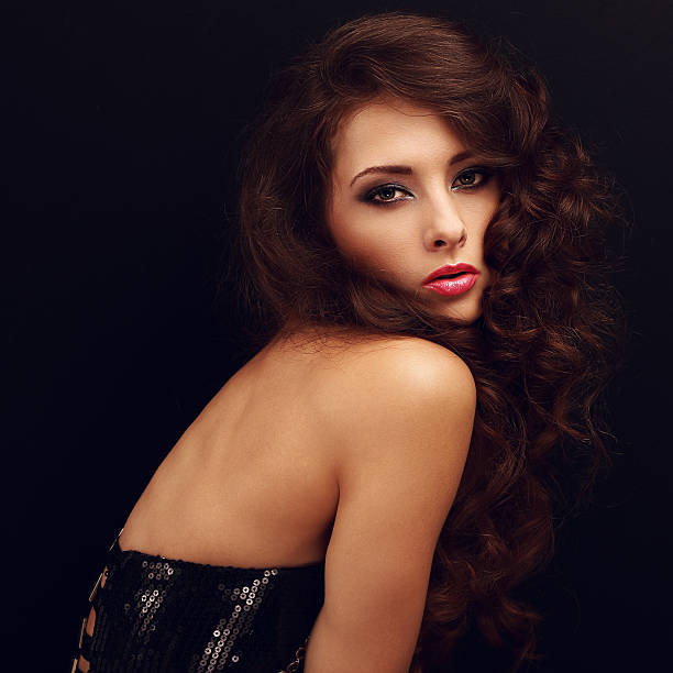 istock Sexy makeup female model with long hair posing 536054973