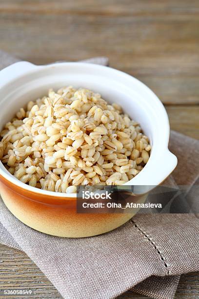 Boiled Pearl Barley In A Ceramic Pot Stock Photo - Download Image Now - 2015, Barley, Brown