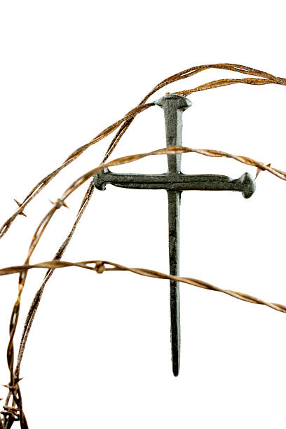 istock Cross of Nails And Barbed Wire 536059135