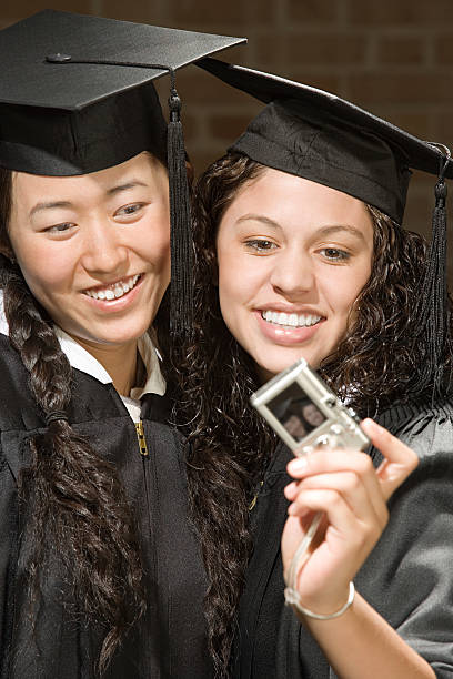 istock Two female graduates taking a photograph 536077901
